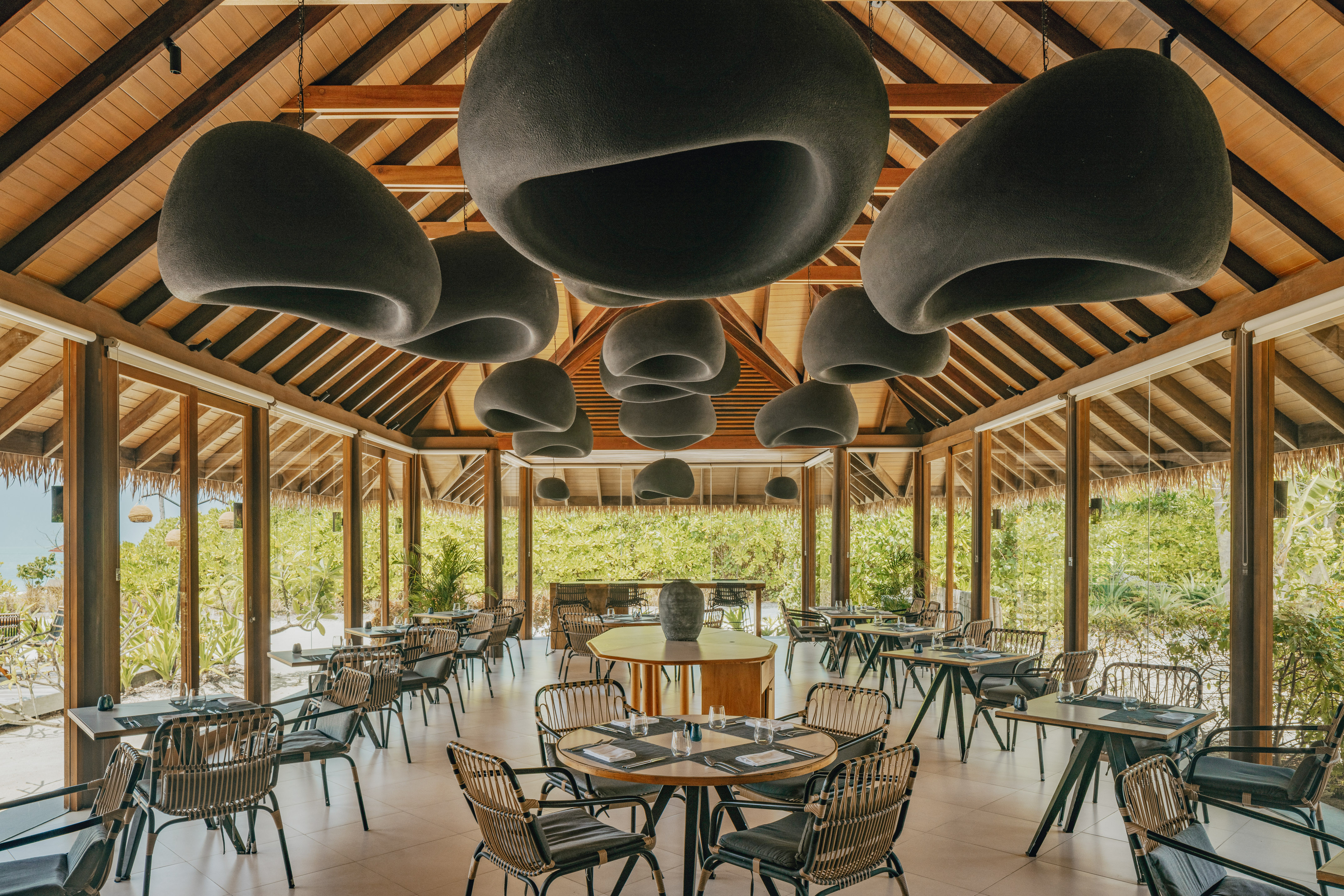 a room with tables and chairs