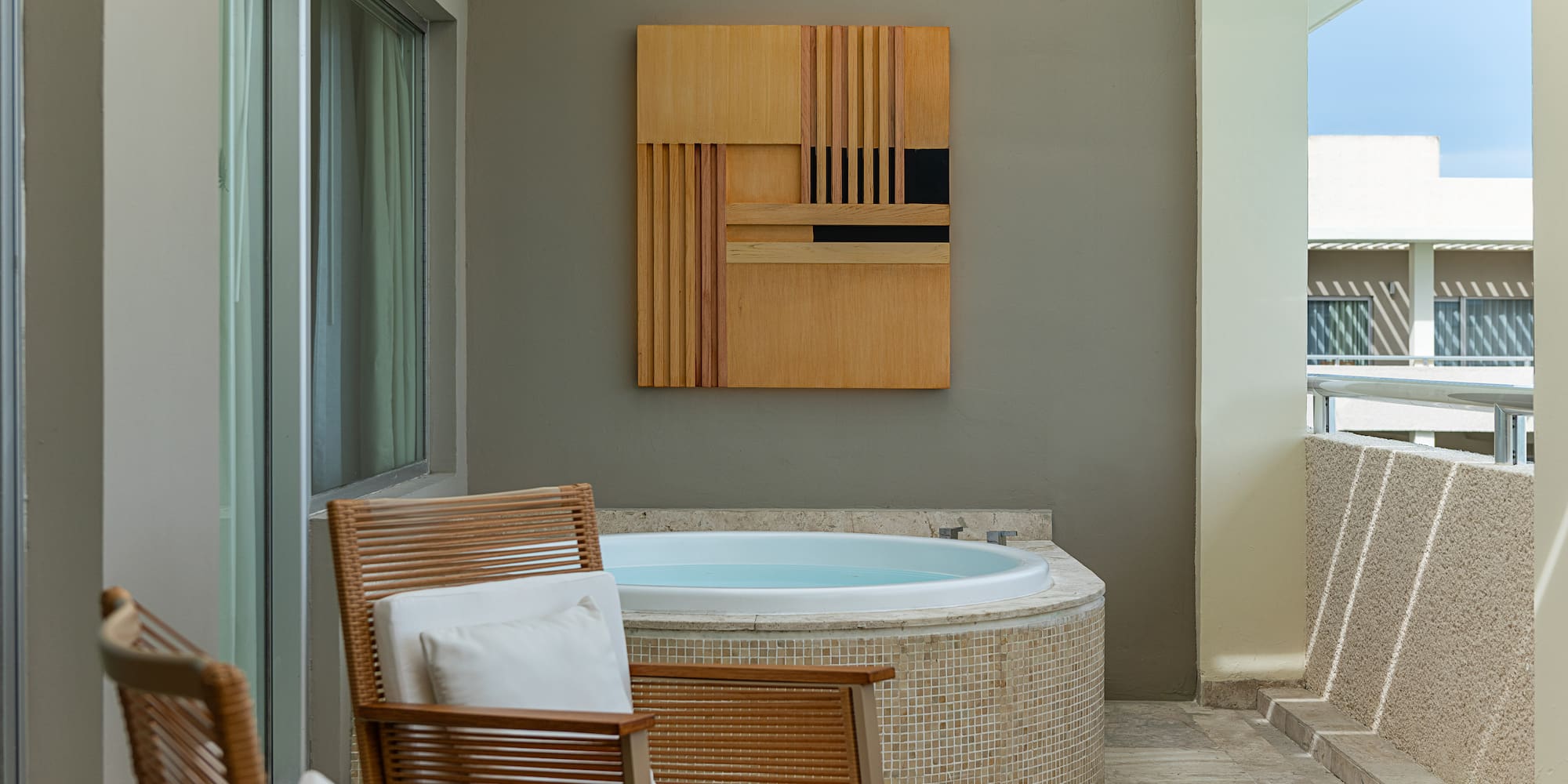 a room with a hot tub and a table