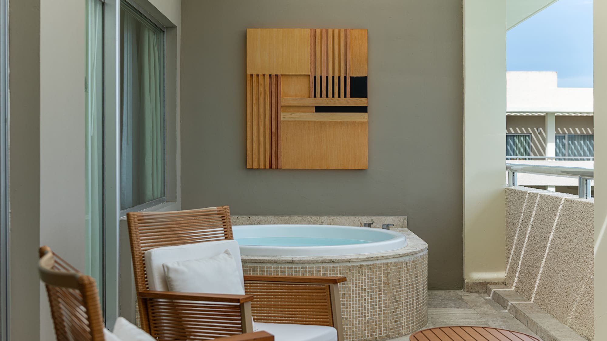 a room with a hot tub and a table