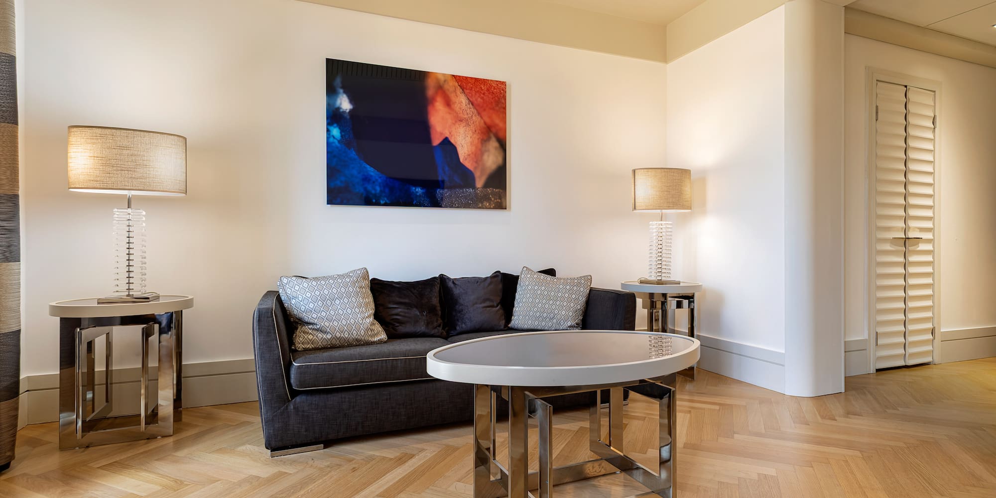 a living room with a couch and a table