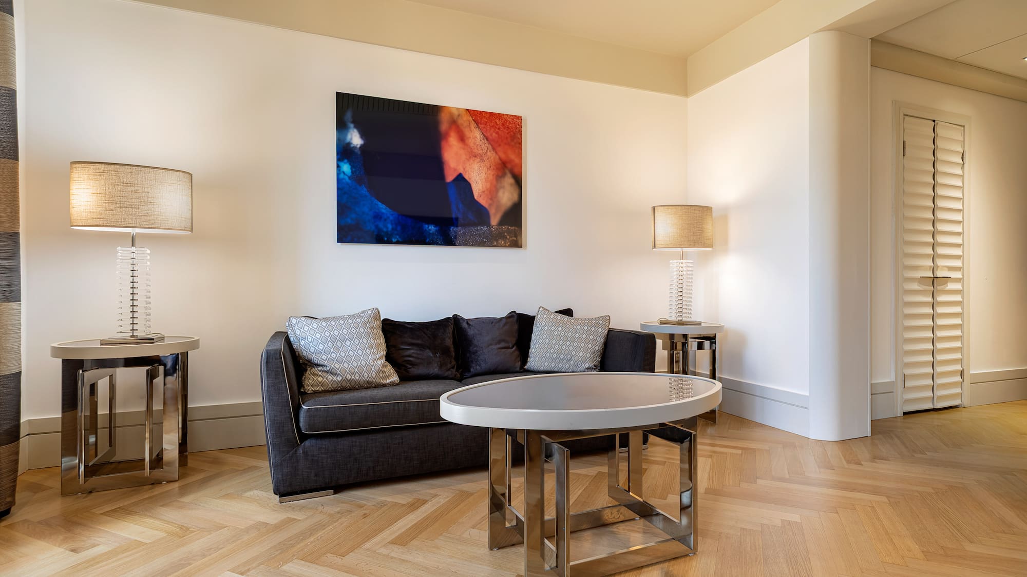 a living room with a couch and a table