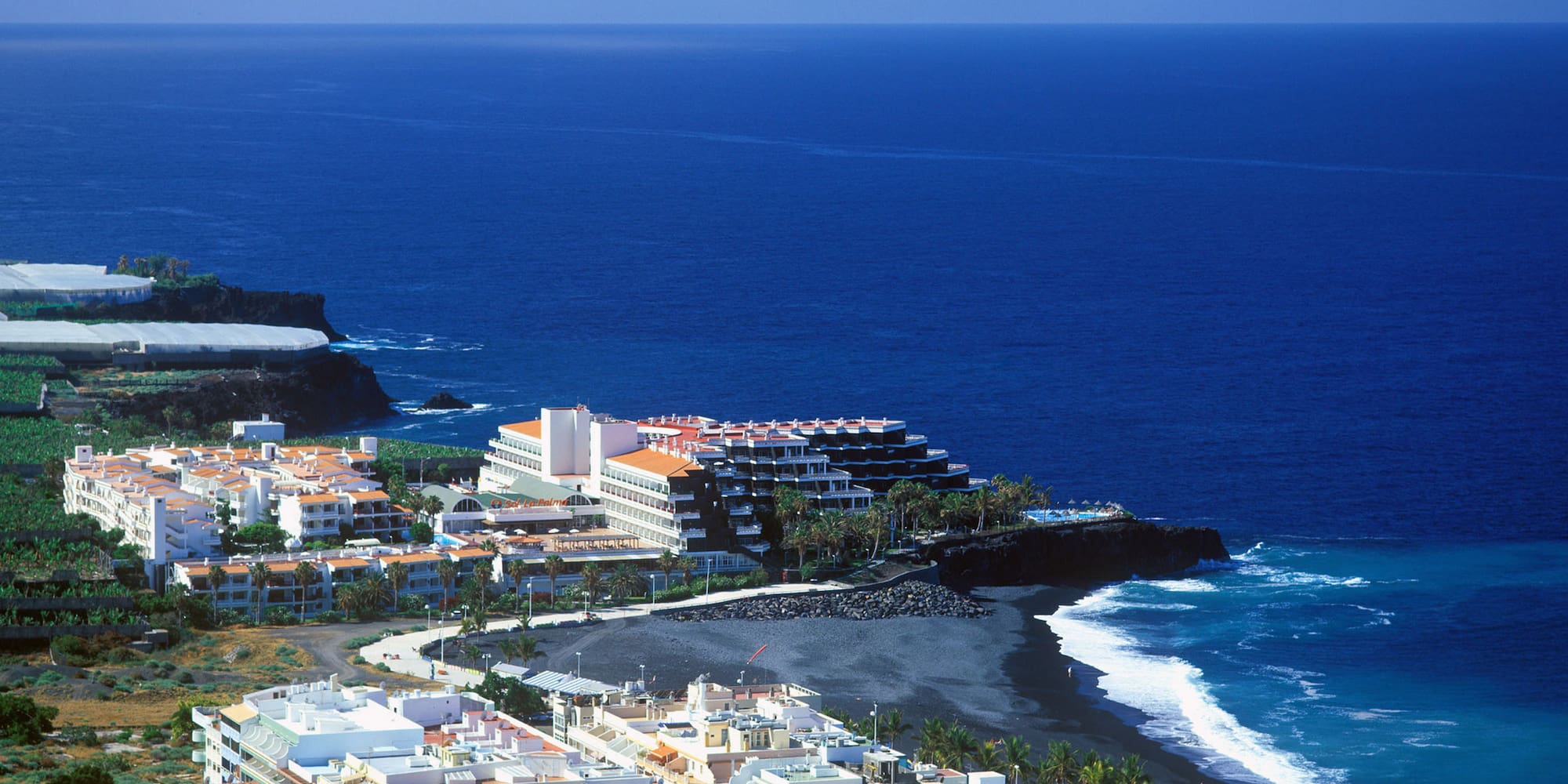 a large body of water next to a beach