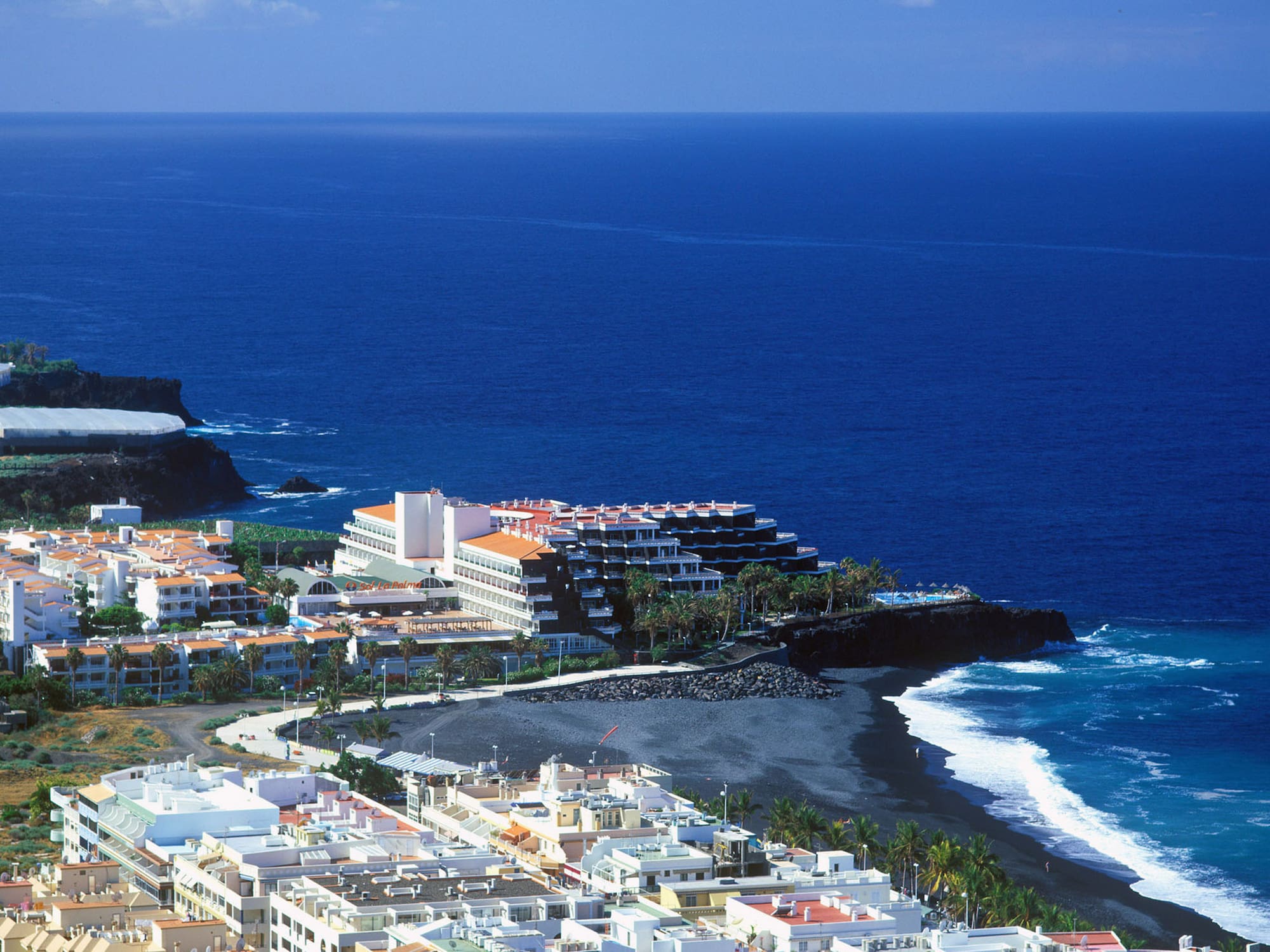 a large body of water next to a beach