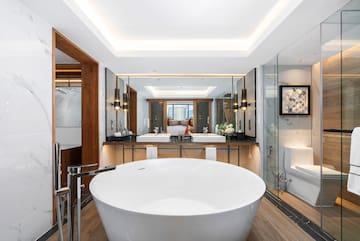 a large white tub in a bathroom
