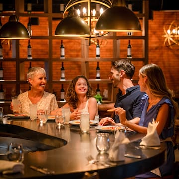 a group of people sitting at a table