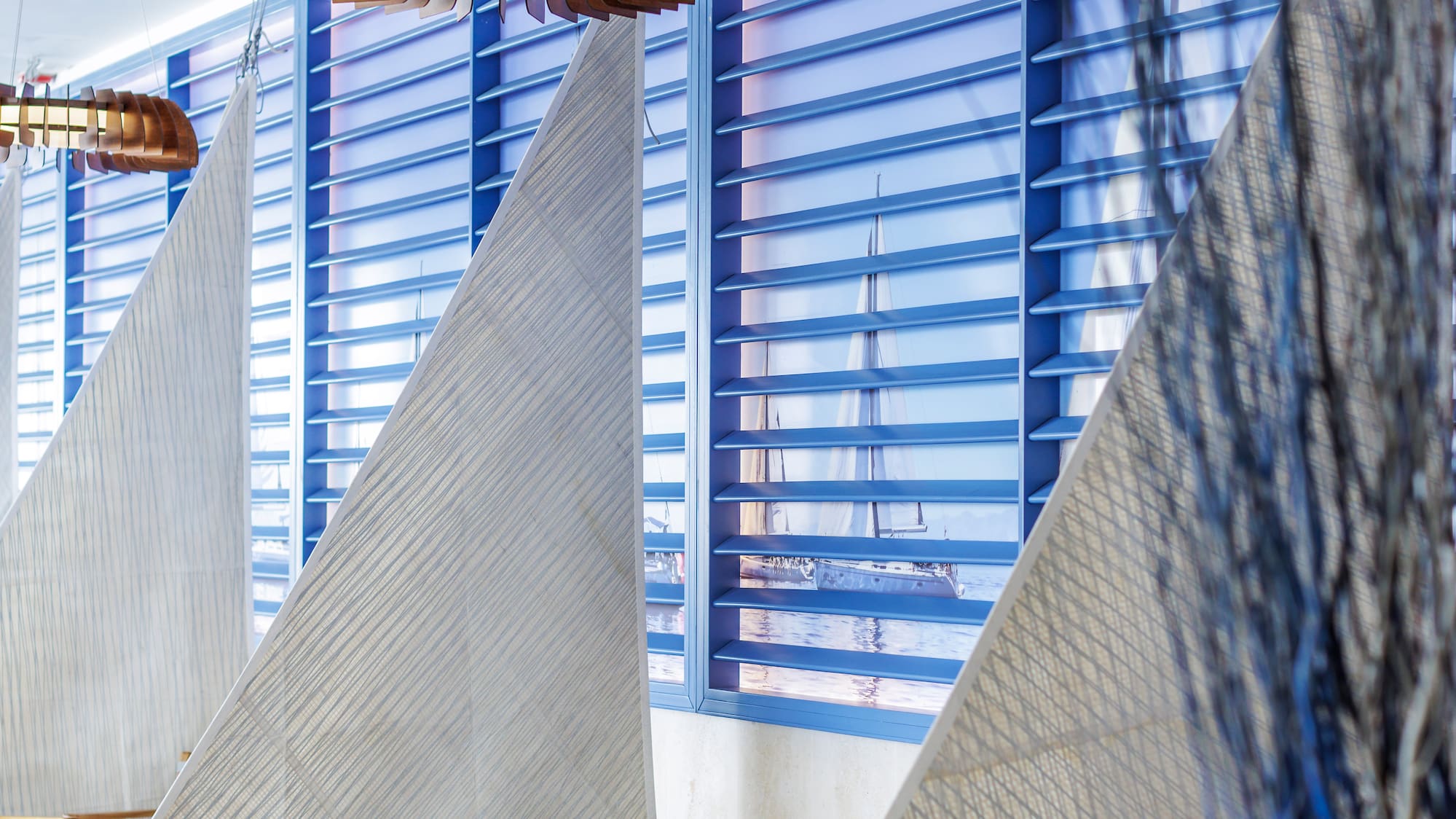 a room with chairs and a window