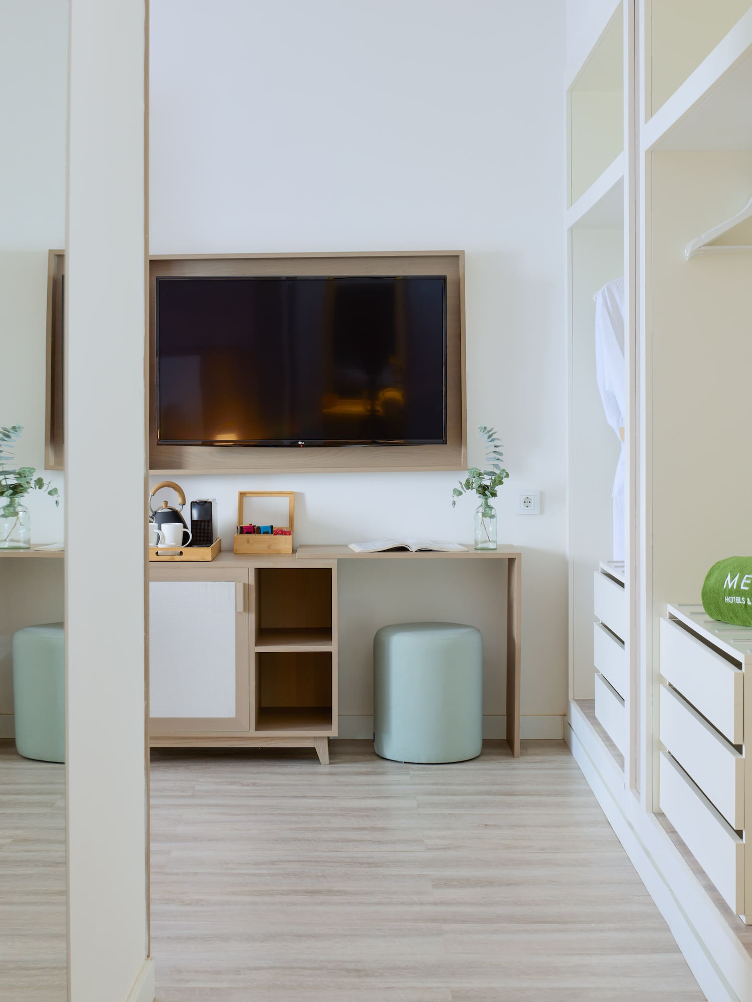 a room with a tv and a table