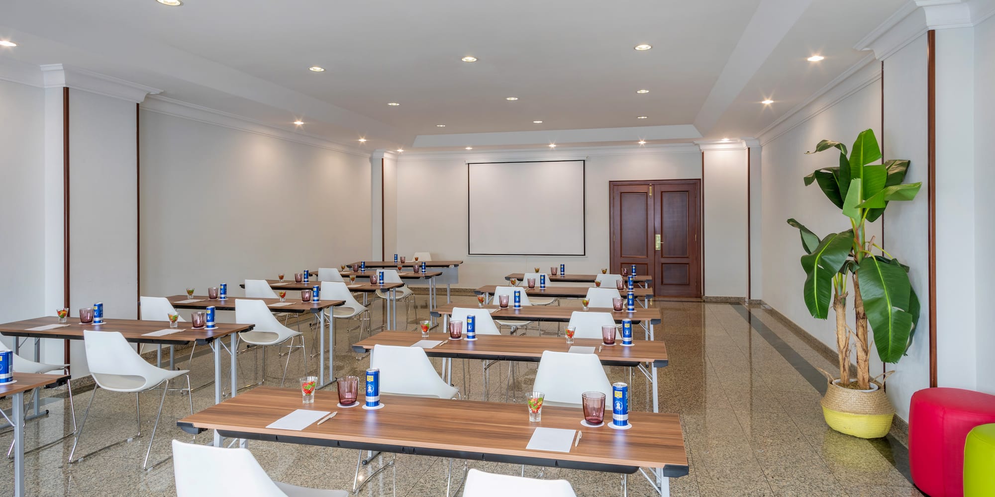 a room with tables and chairs