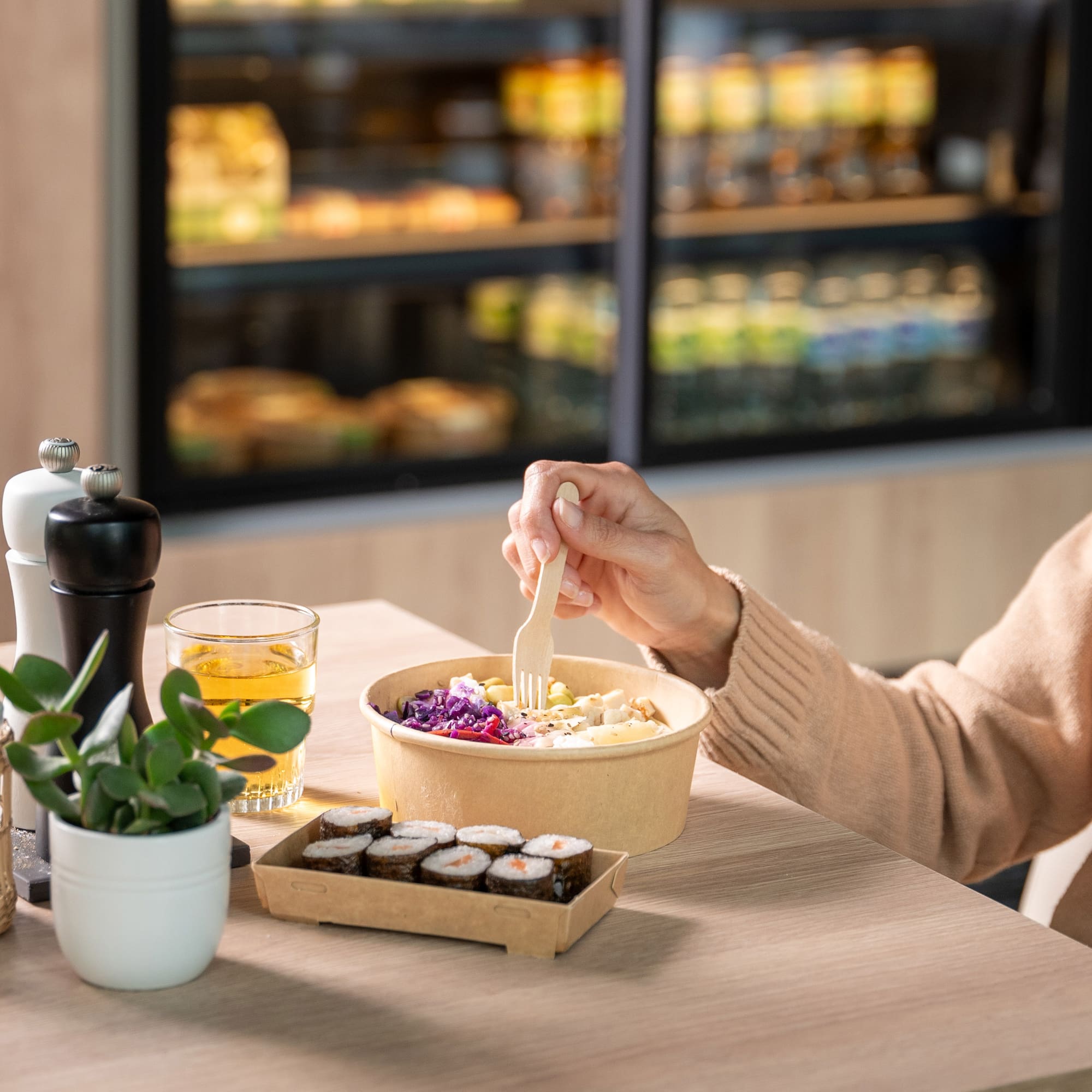 a person eating a salad.