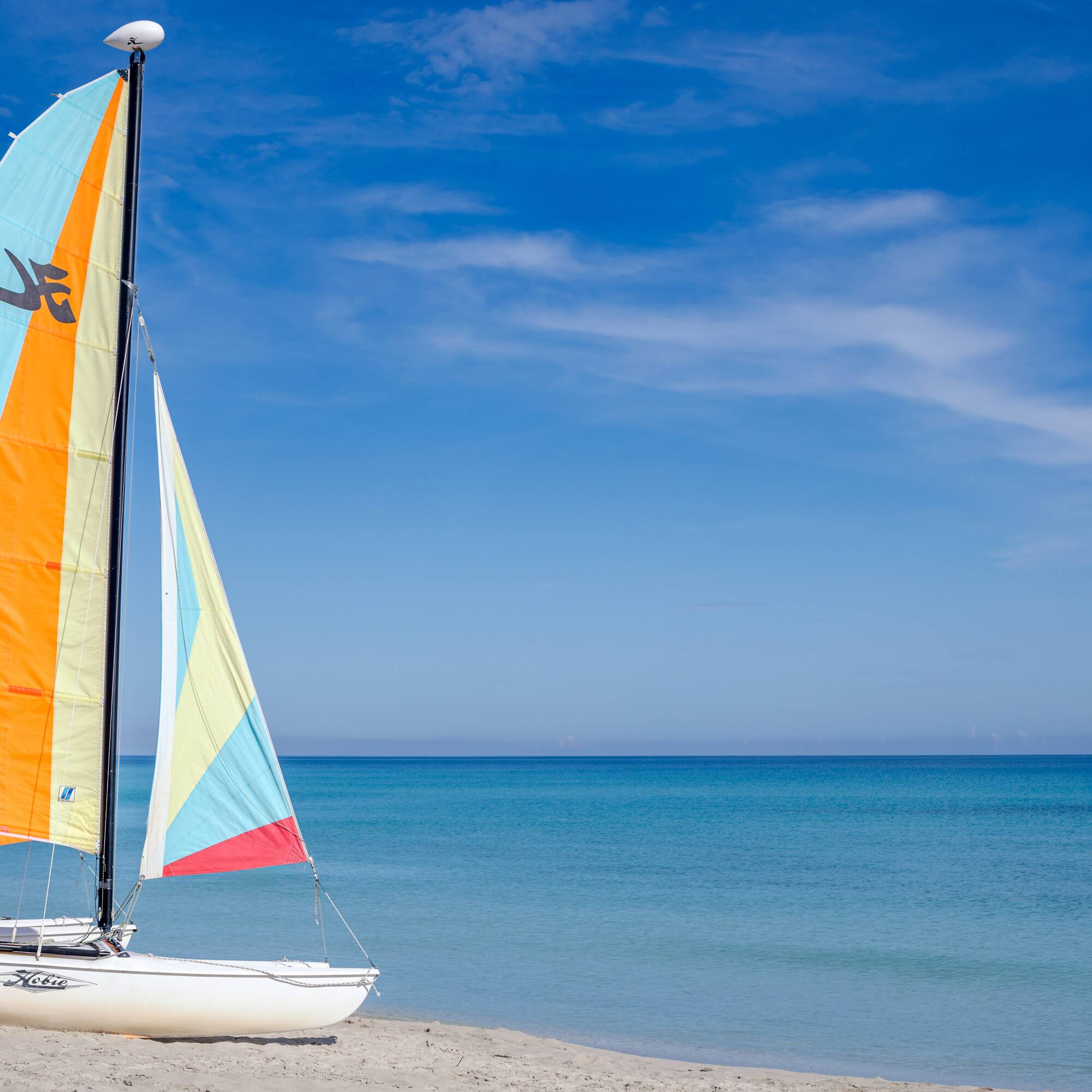 a sailboat on a beach