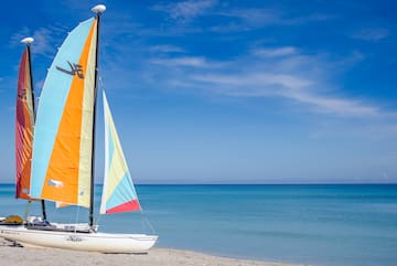 a sailboat on a beach