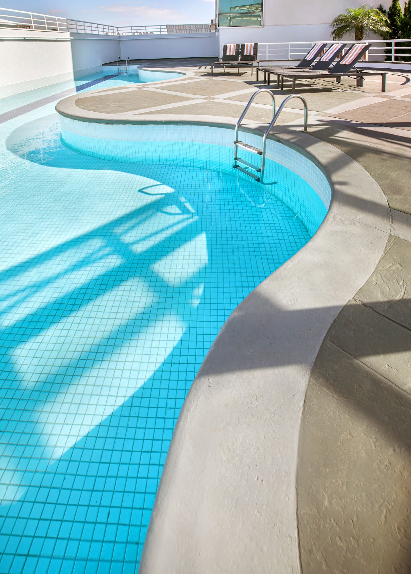 a pool with a ladder