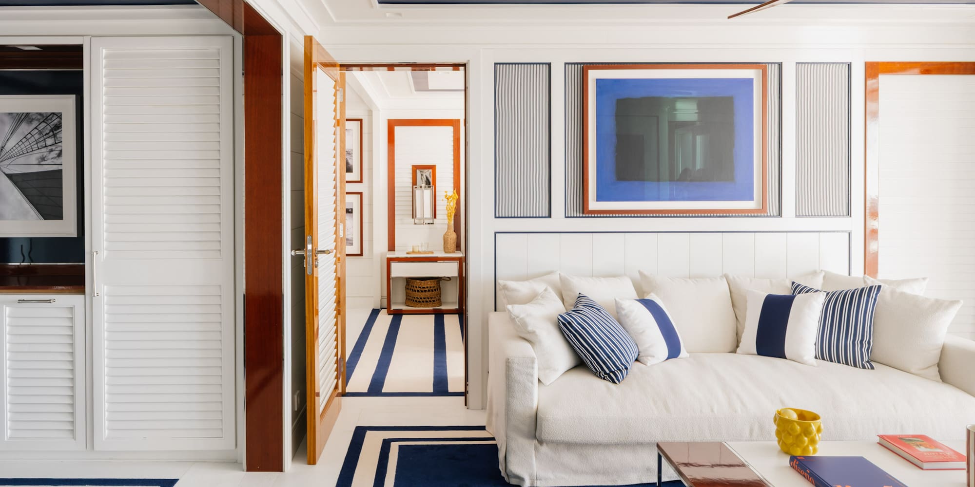 a room with a couch and a rug