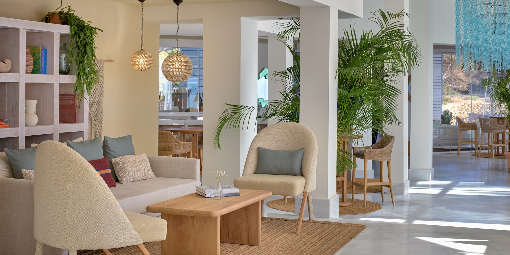 a room with a couch and chairs