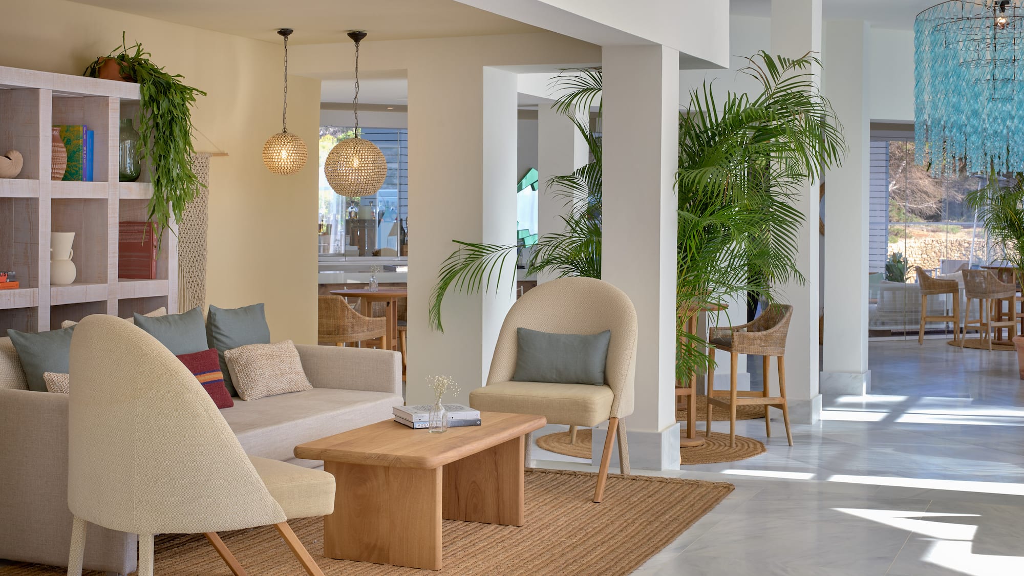 a room with a couch and chairs