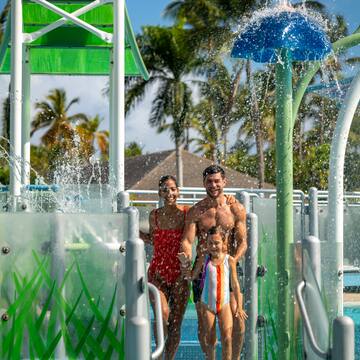 a group of people in a water park