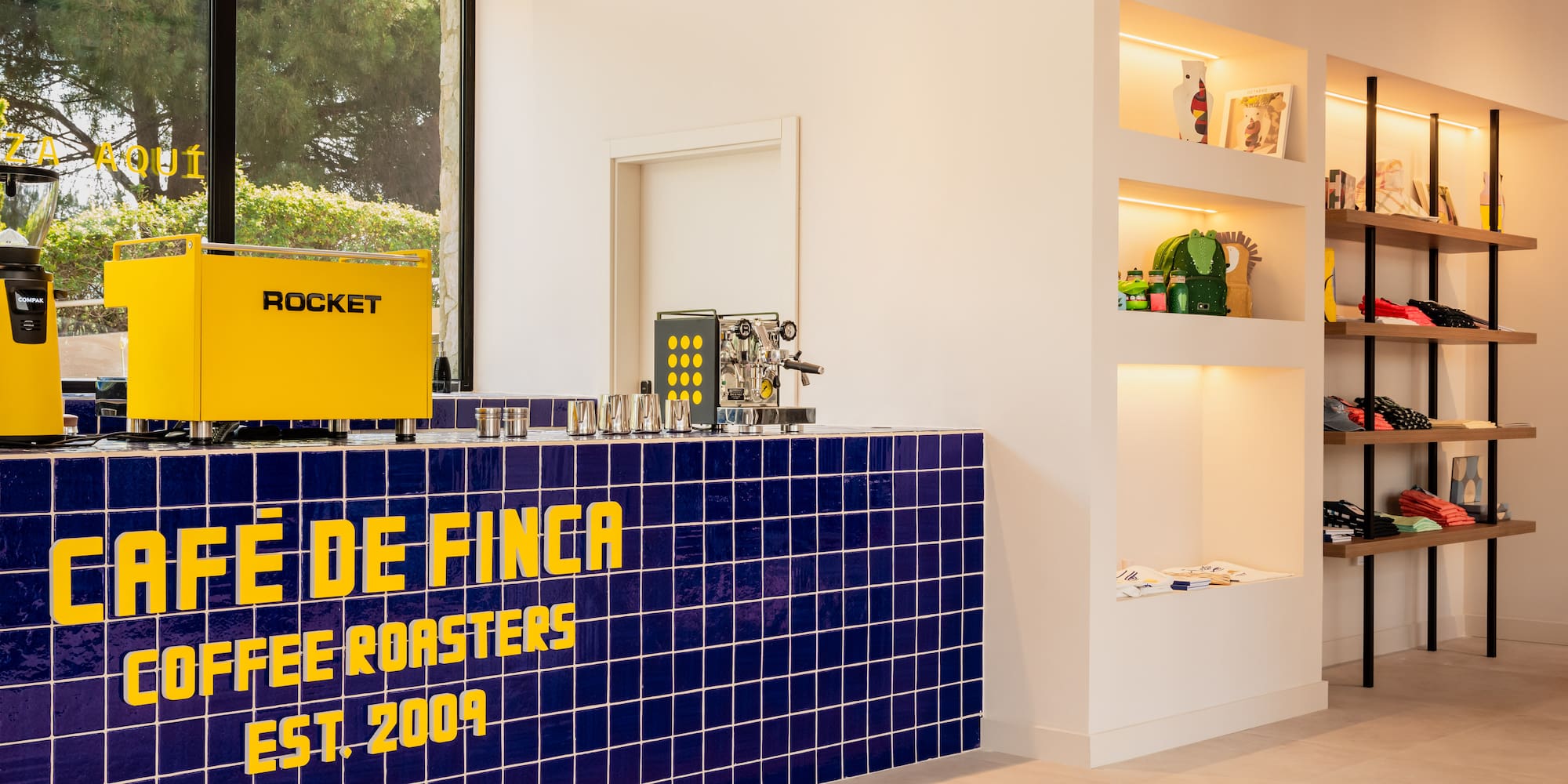 a blue and yellow counter with a sign on it