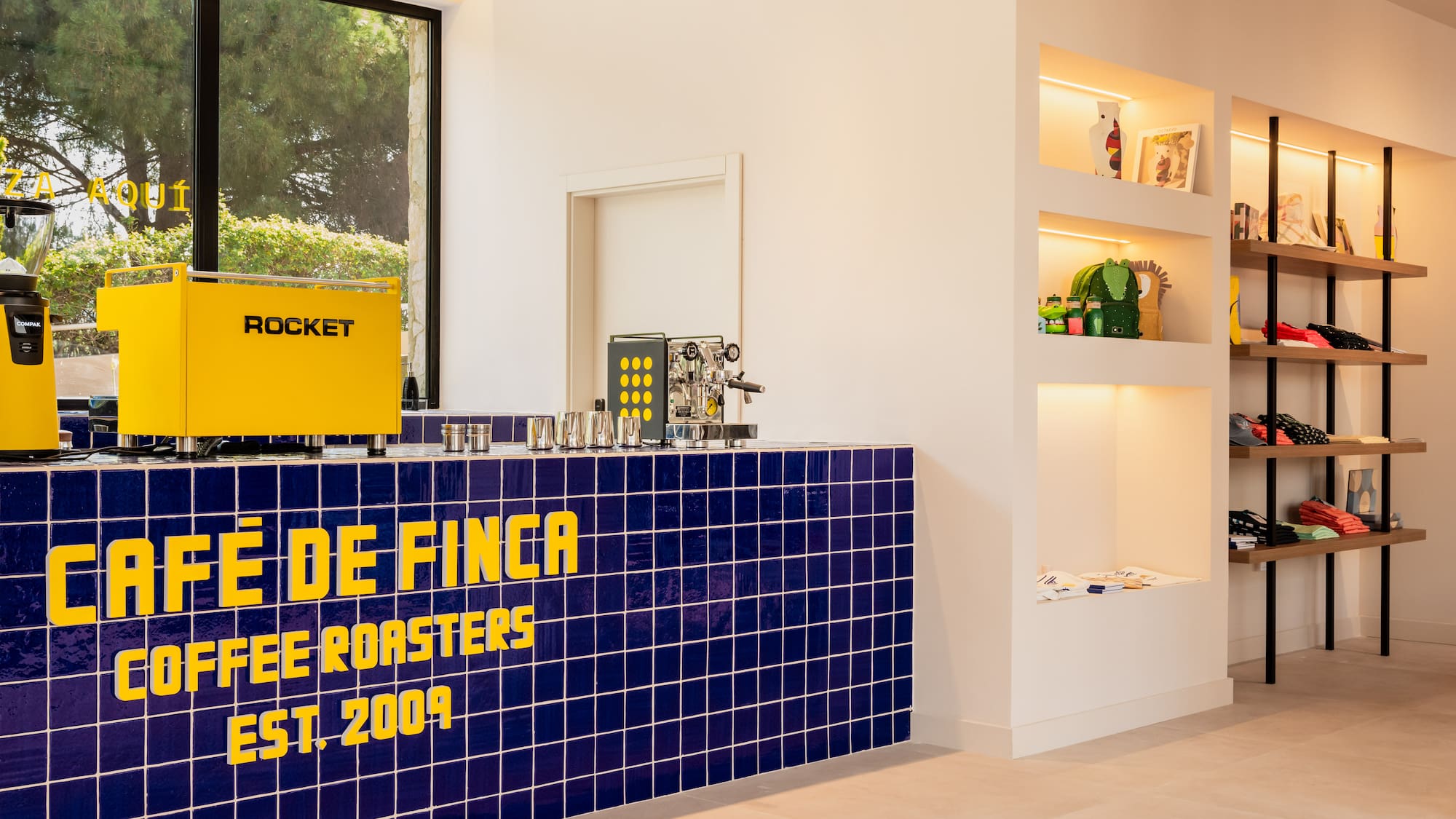 a blue and yellow counter with a sign on it