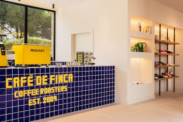 a blue and yellow counter with a sign on it