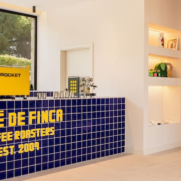 a blue and yellow counter with a sign on it