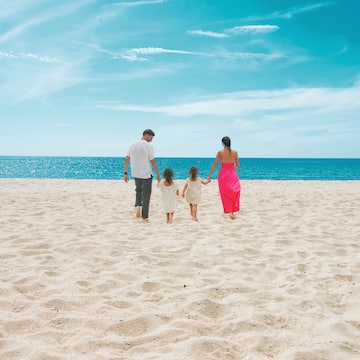 a family walking on a beach