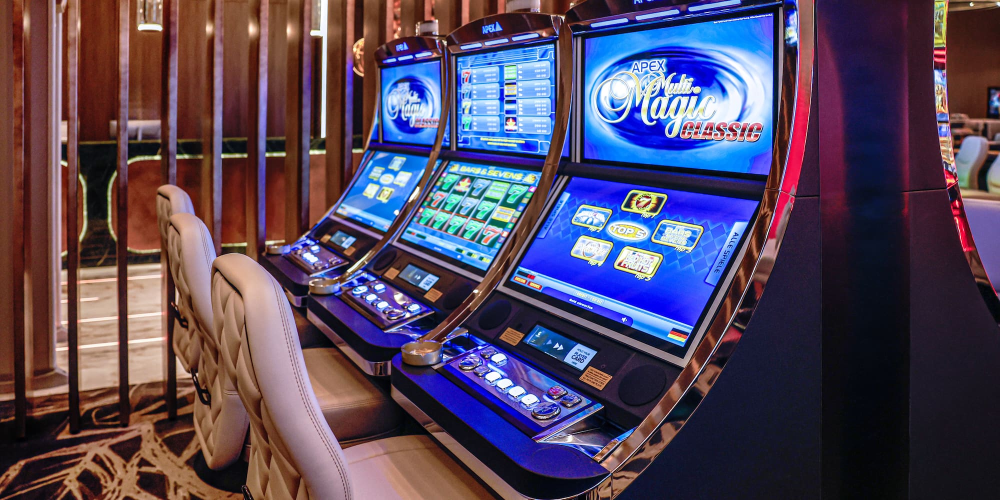 a row of slot machines in a casino