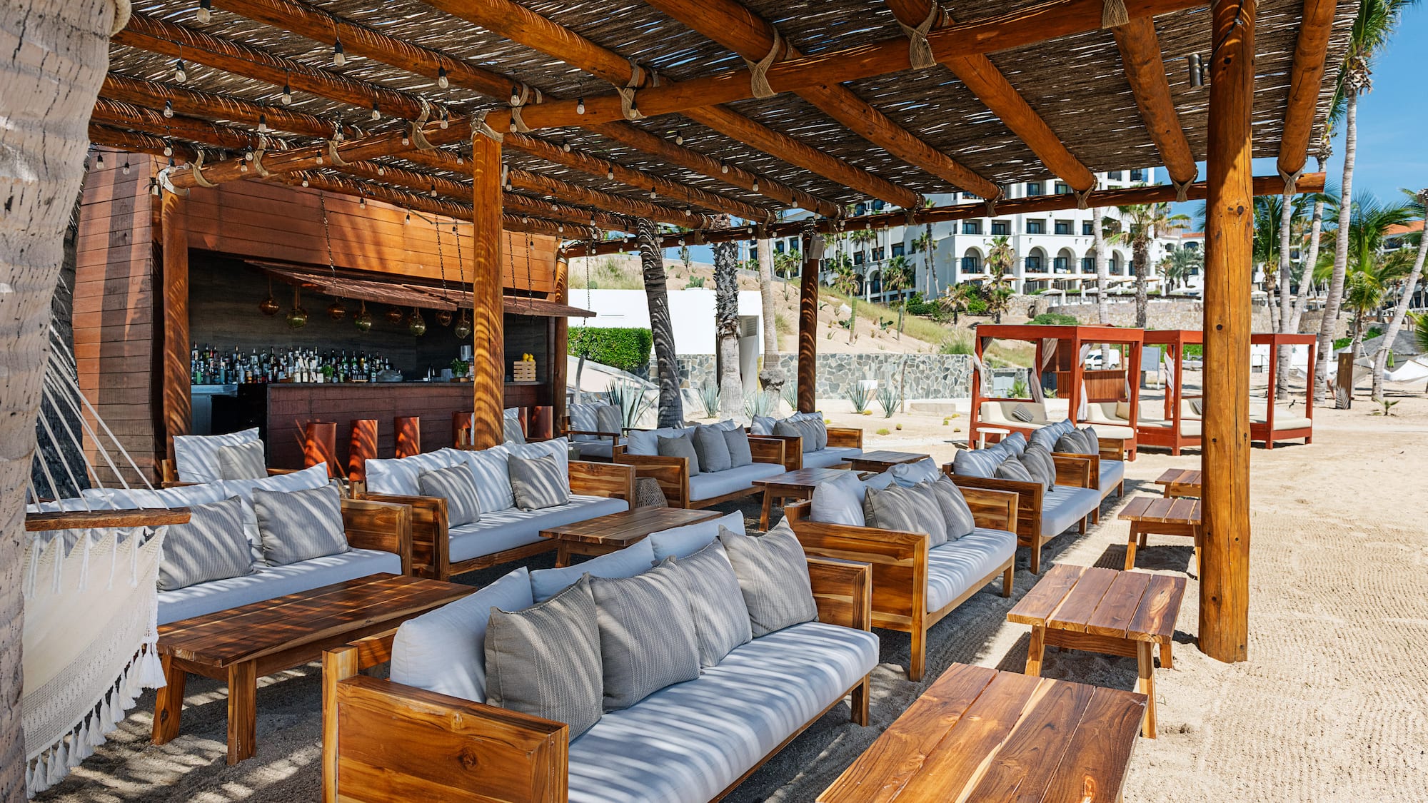 a lounge area with couches and tables