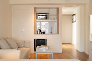 a living room with a couch and a coffee table