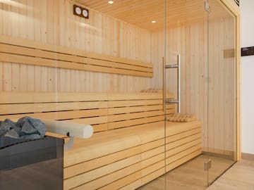 a wooden sauna with glass doors