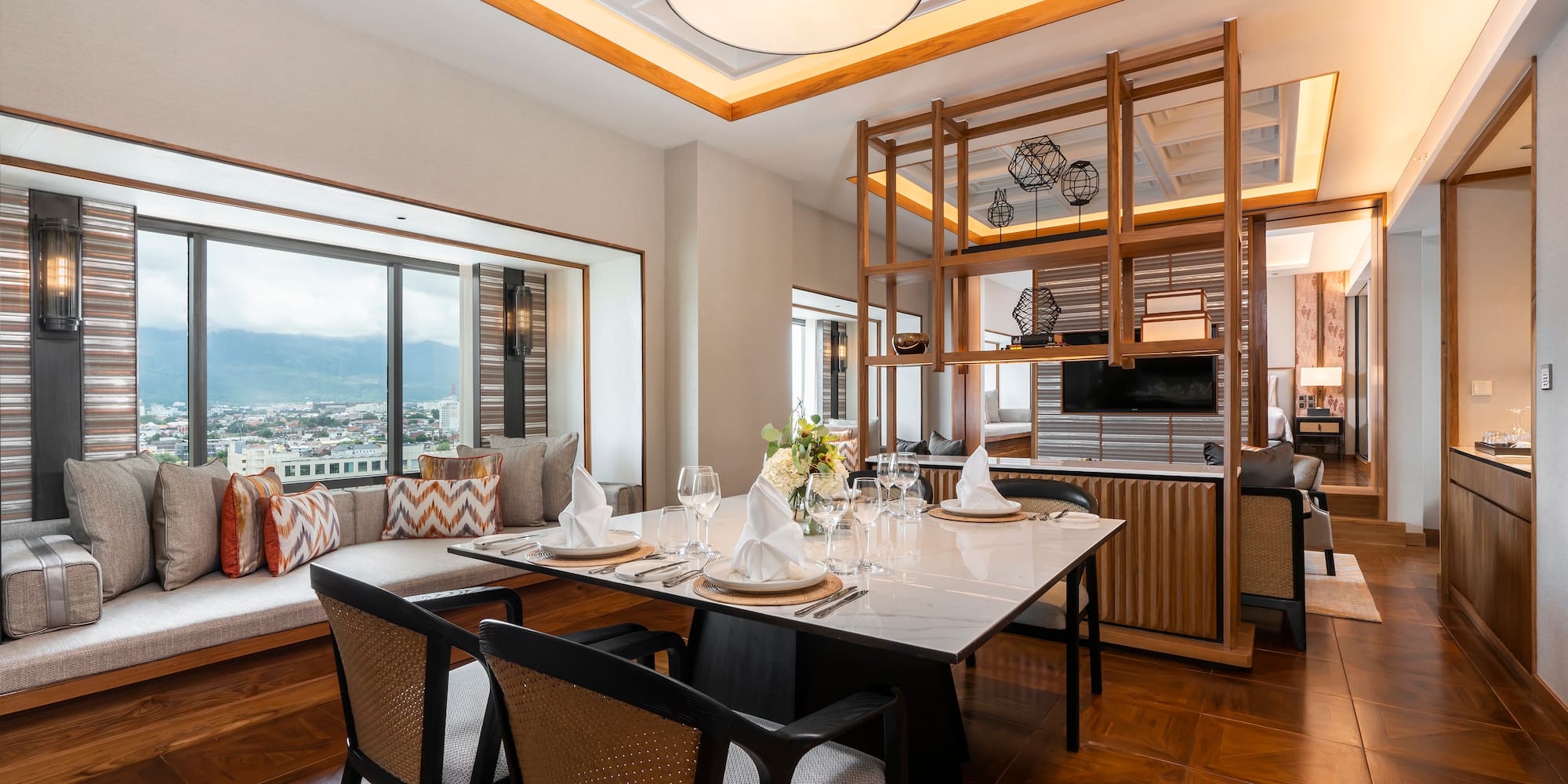 a dining room with a table and chairs