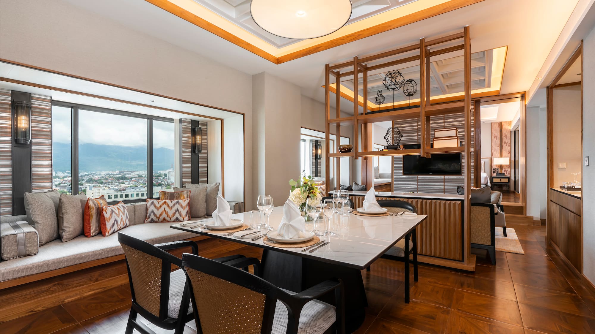 a dining room with a table and chairs