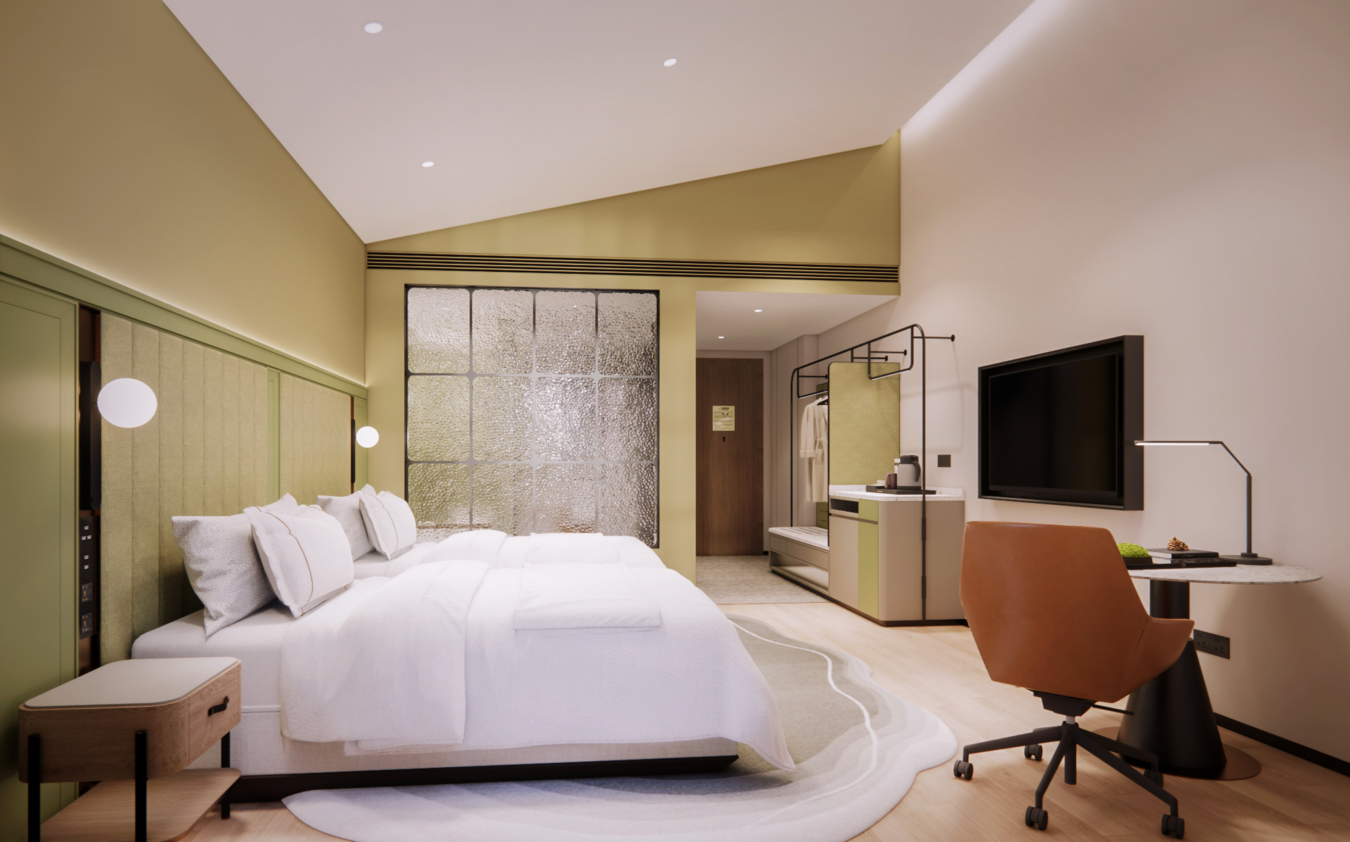 Modern hotel room with king bed, green accents, glass wall, and work area.