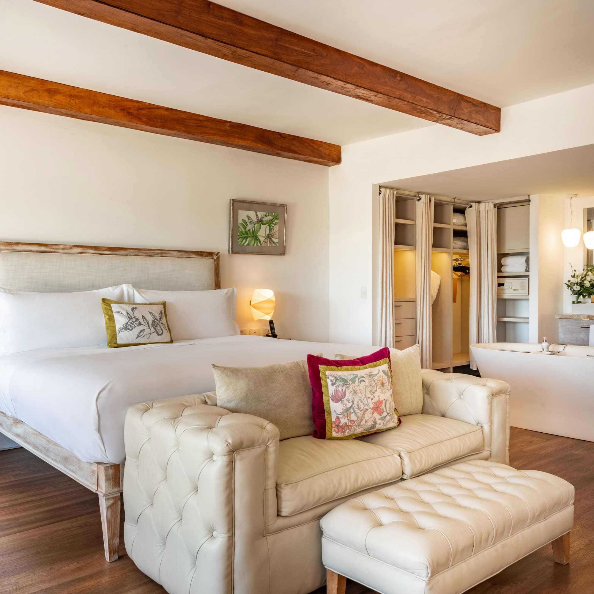 a bedroom with a bed and a bathtub