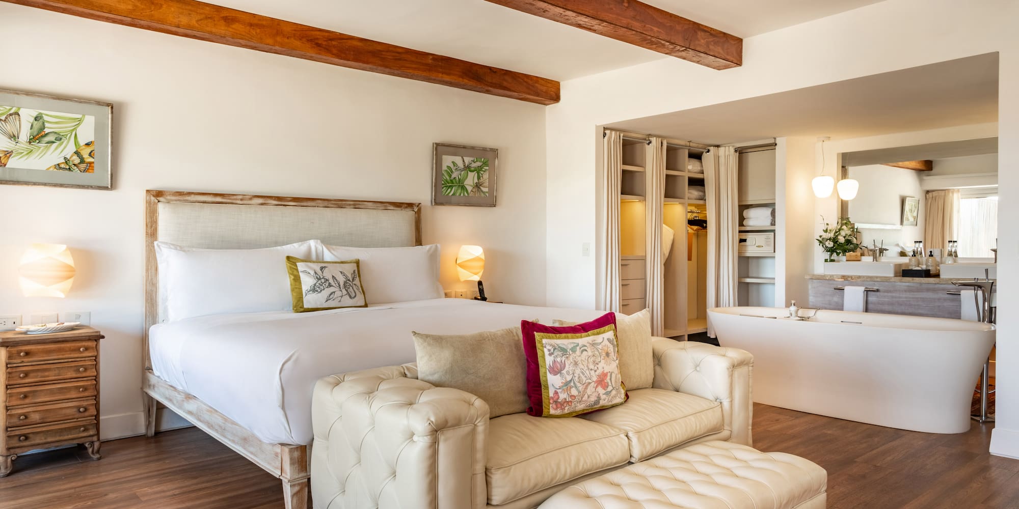 a bedroom with a bed and a bathtub