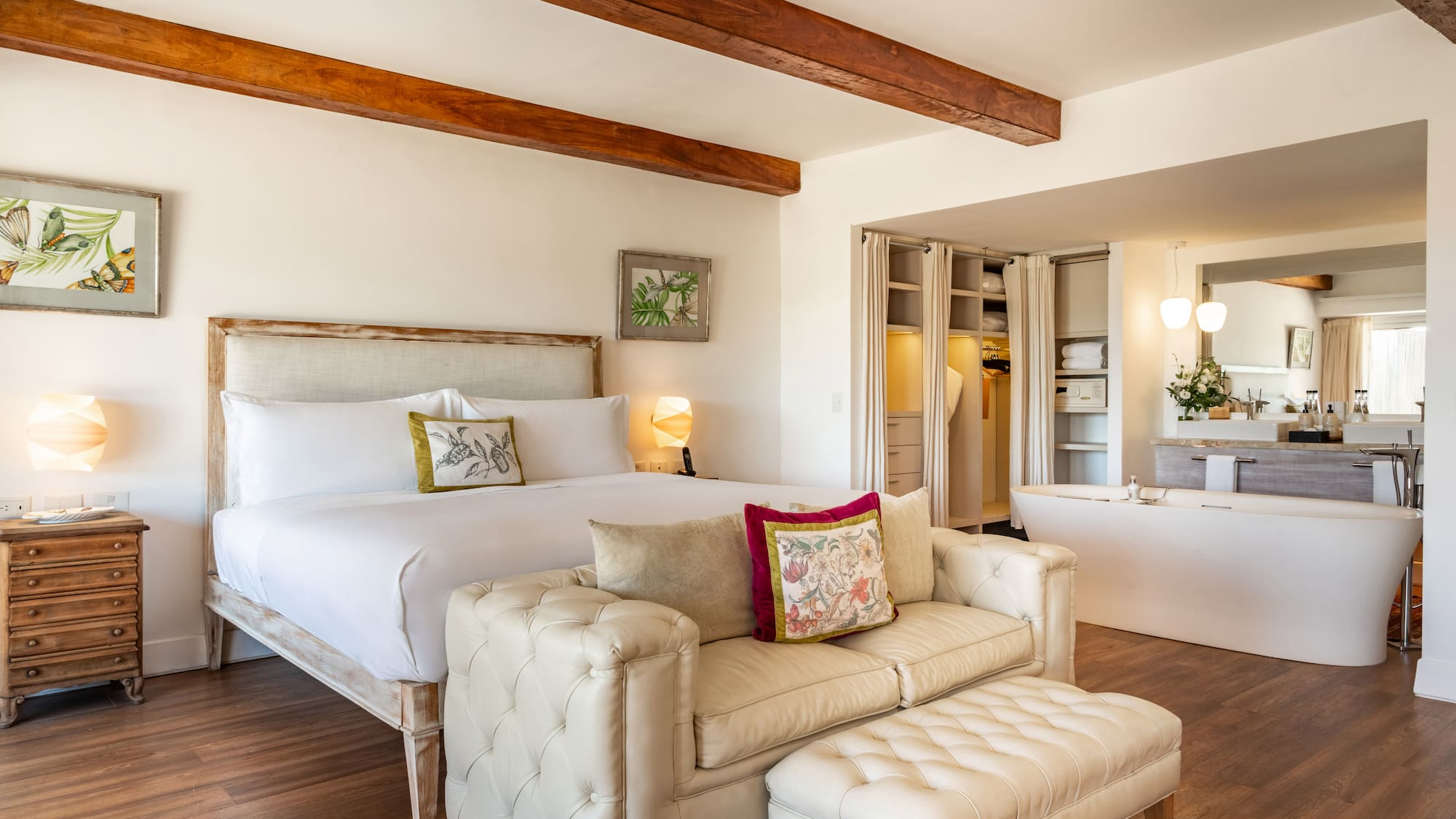 a bedroom with a bed and a bathtub