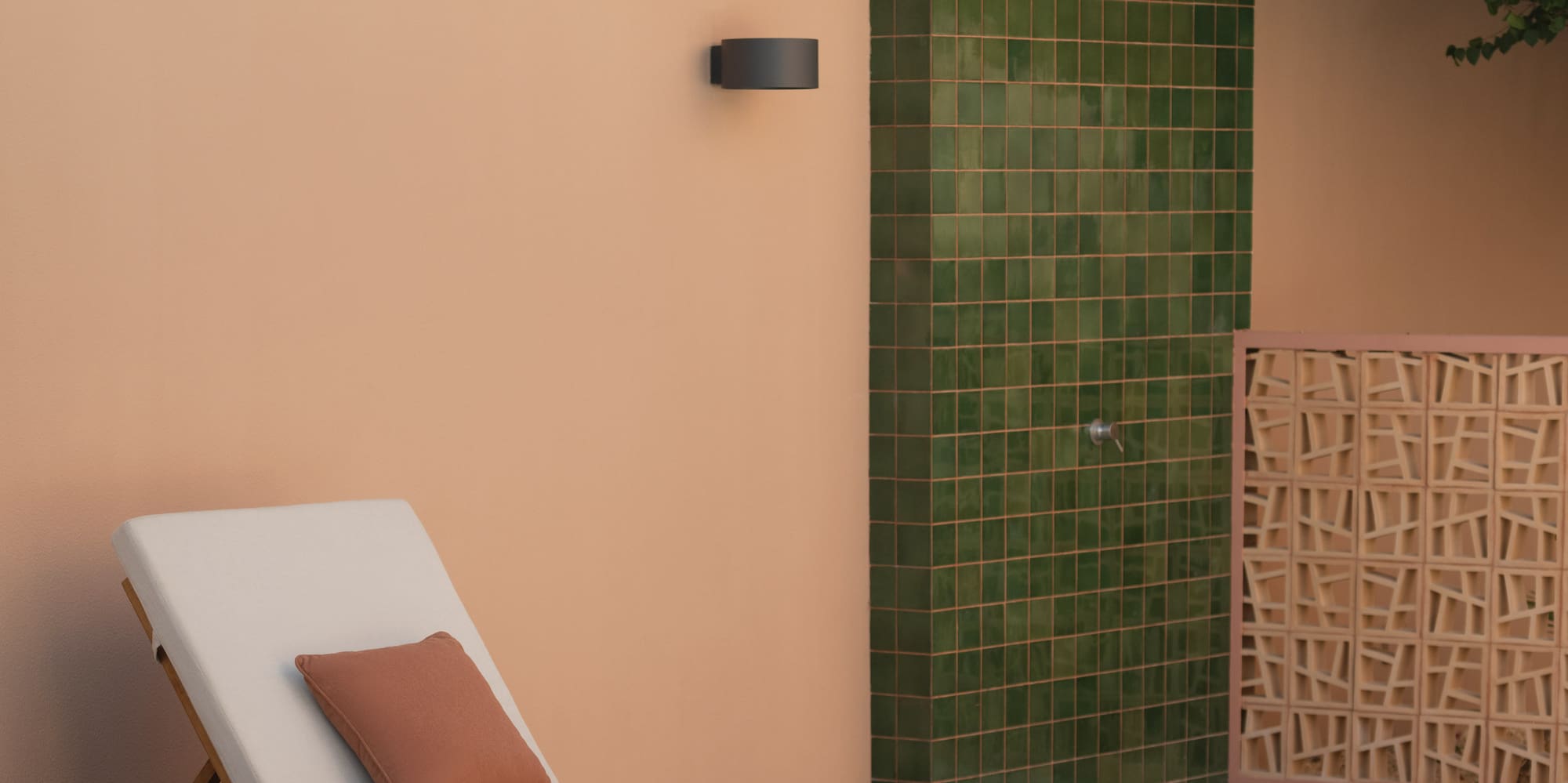 a lounge chairs outside a shower