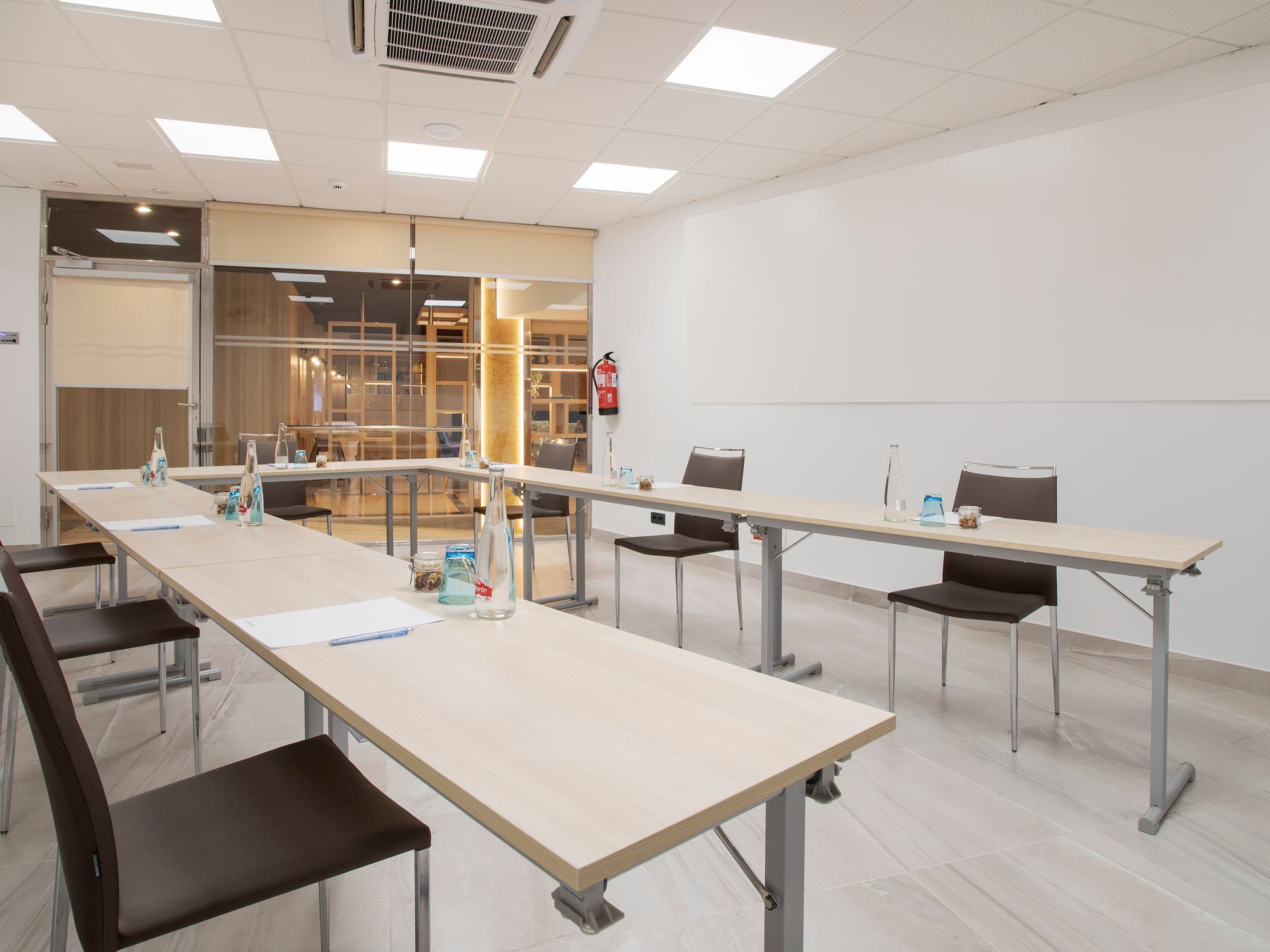 a room with tables and chairs