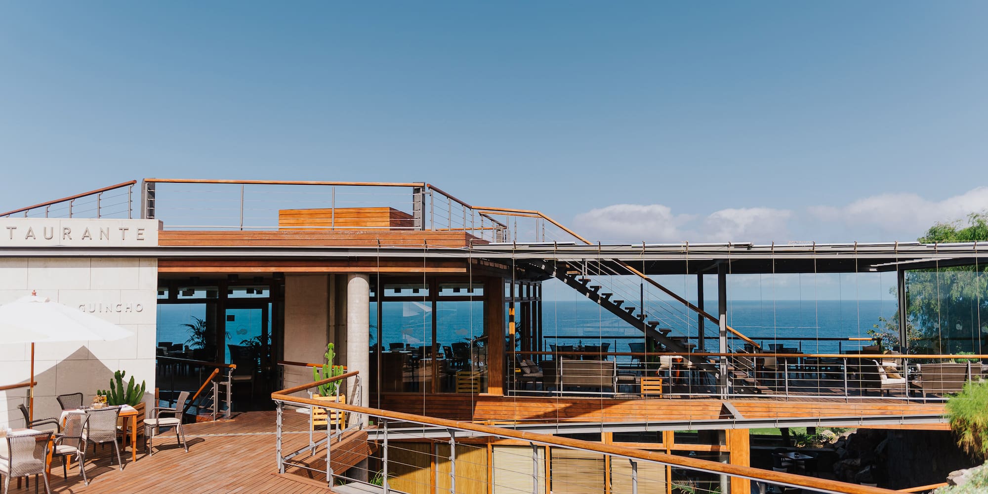 a building with a deck and stairs