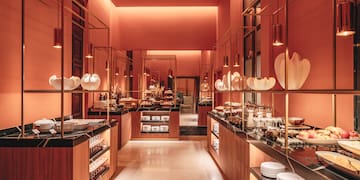 a room with shelves of food and lights