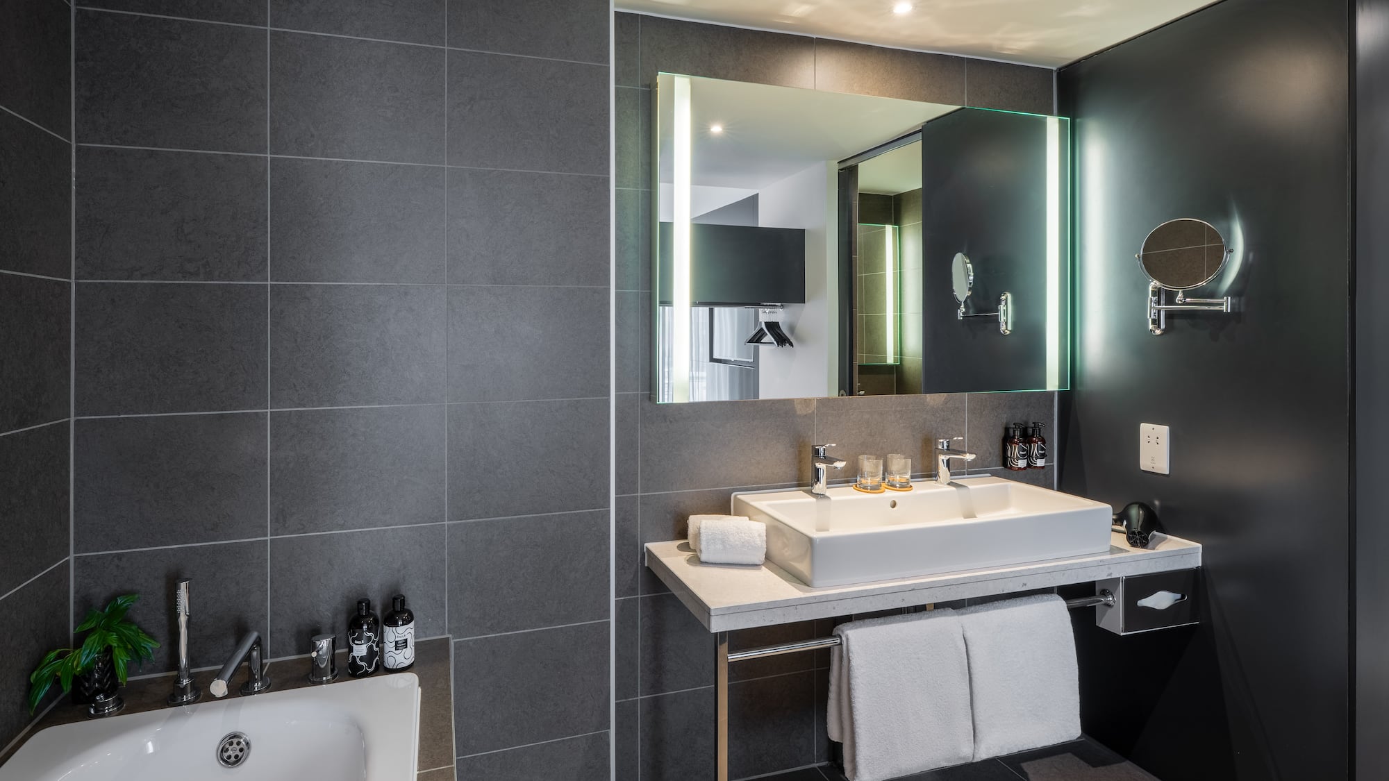 a bathroom with a sink and a bathtub