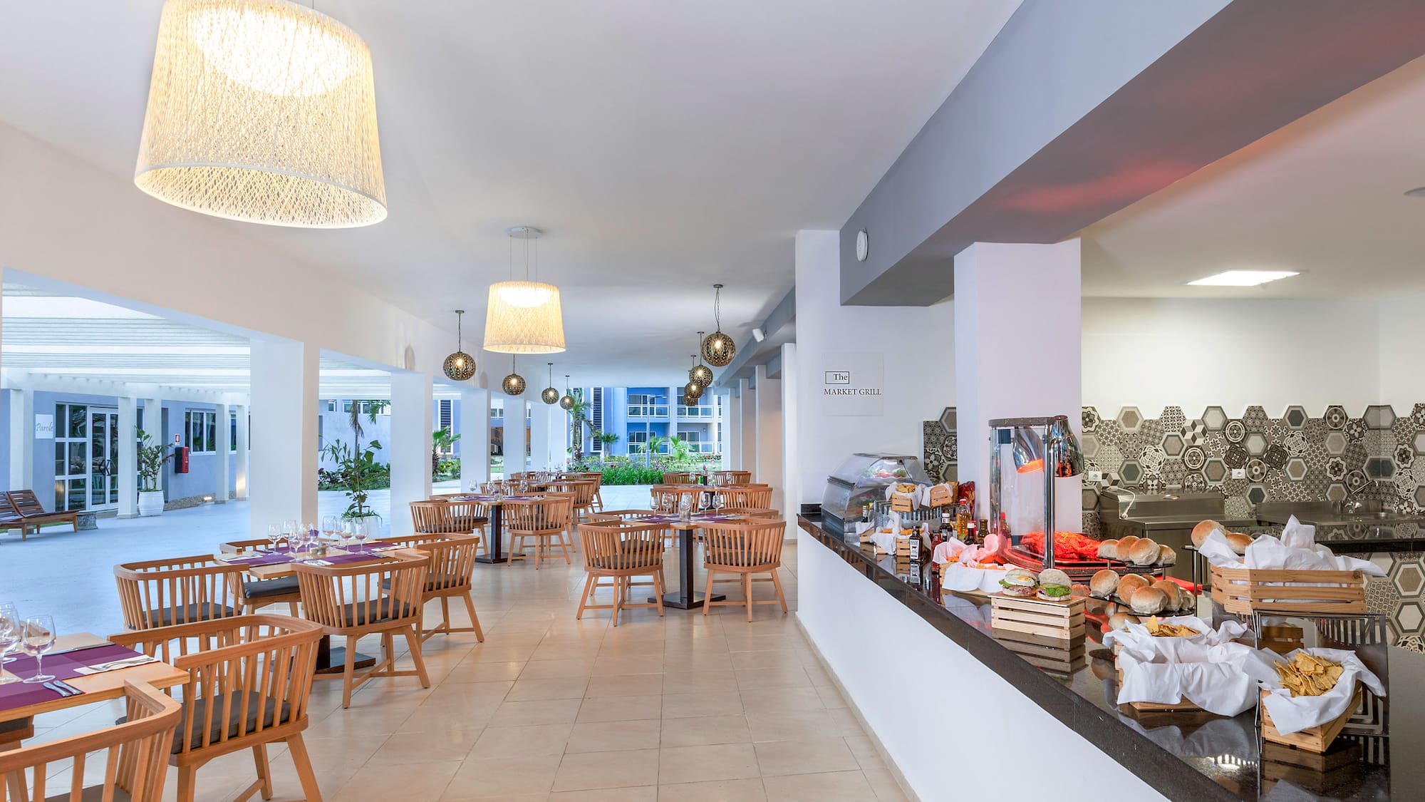 a restaurant with tables and chairs