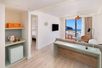 a room with a television and a table