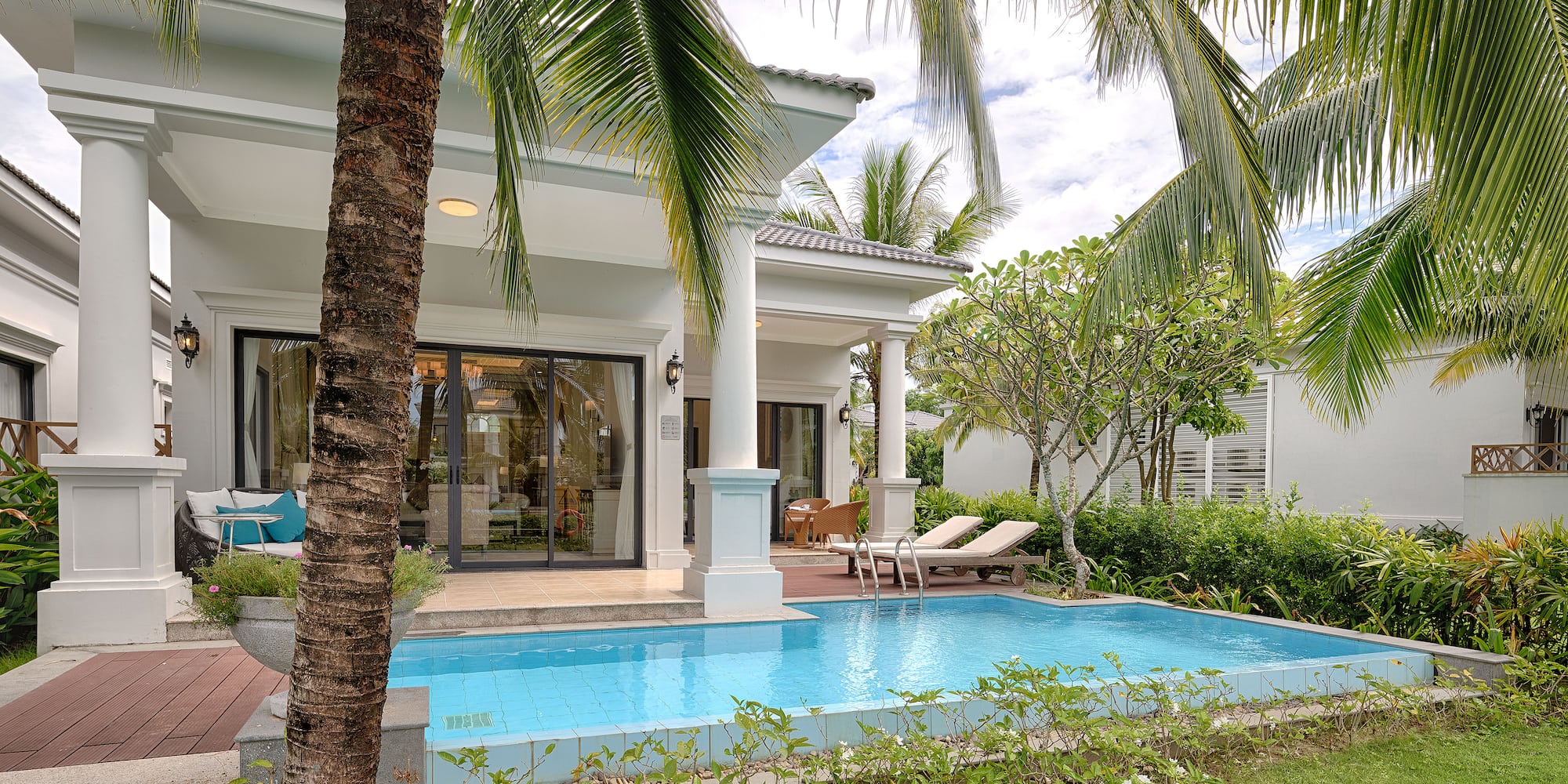 a pool in front of a house