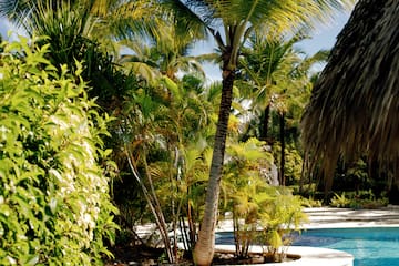 a woman and a child in a pool