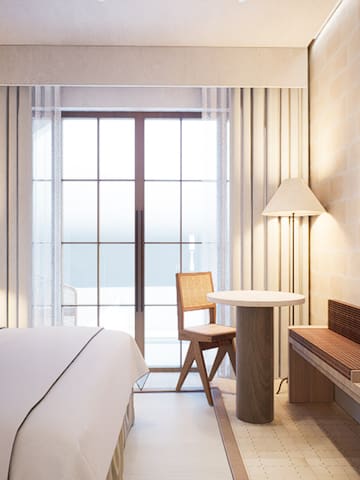 a room with a bed and a tv