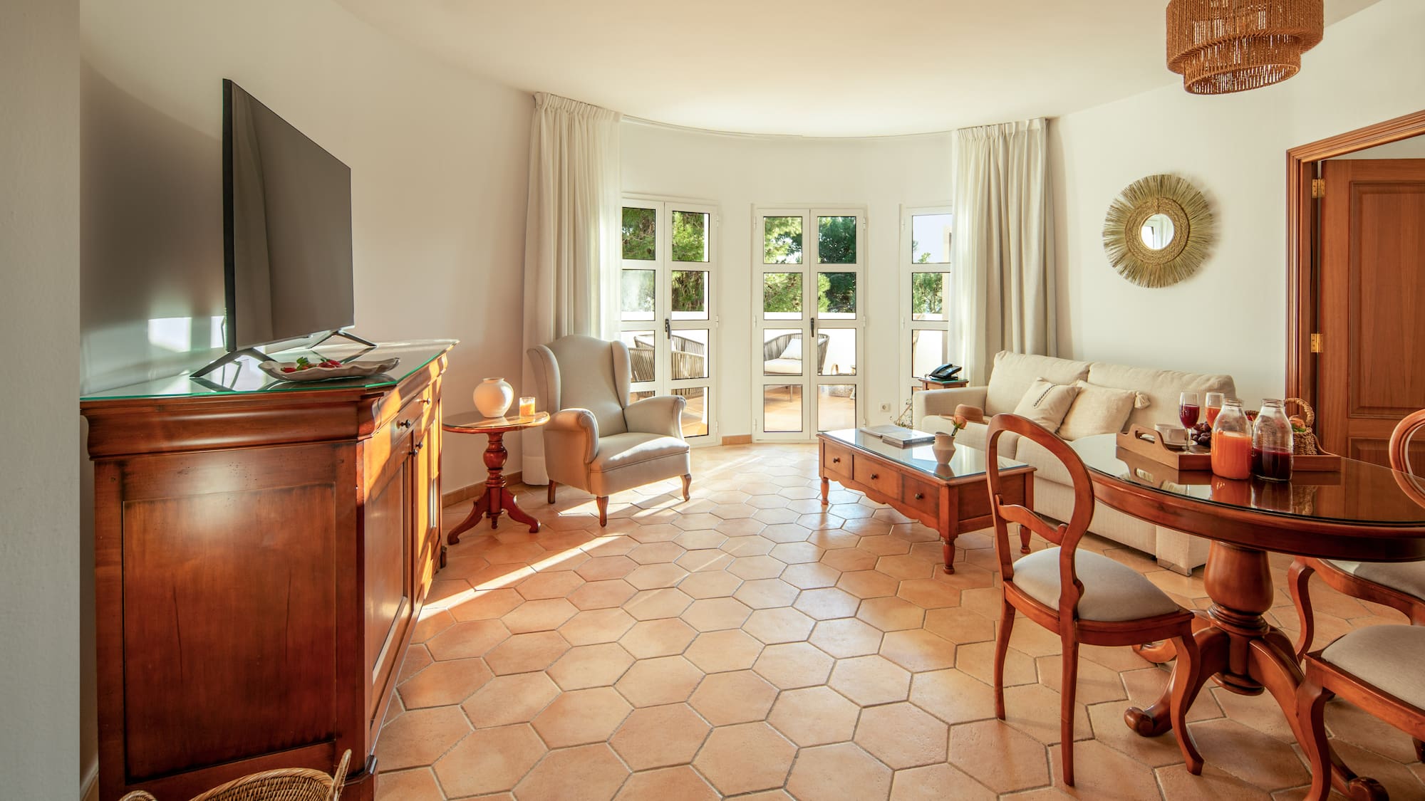 a living room with a television and furniture