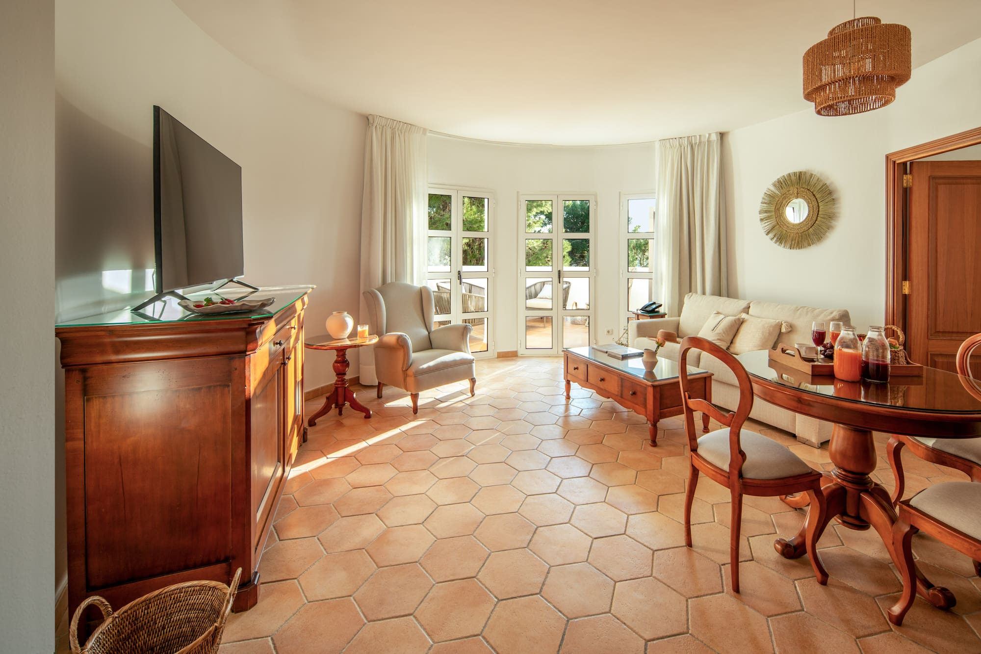 a living room with a television and furniture