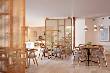 a room with tables and chairs