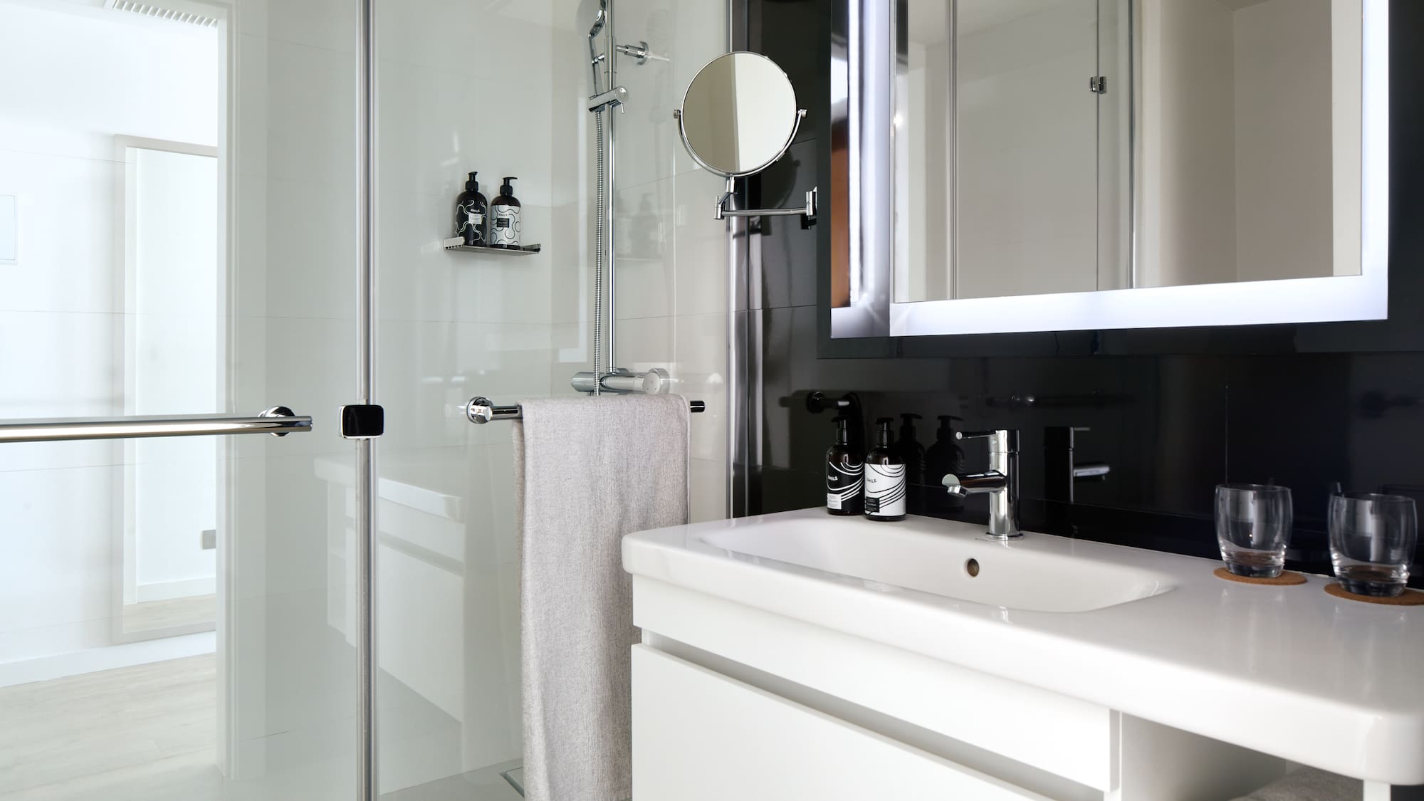 a bathroom with a mirror and sink