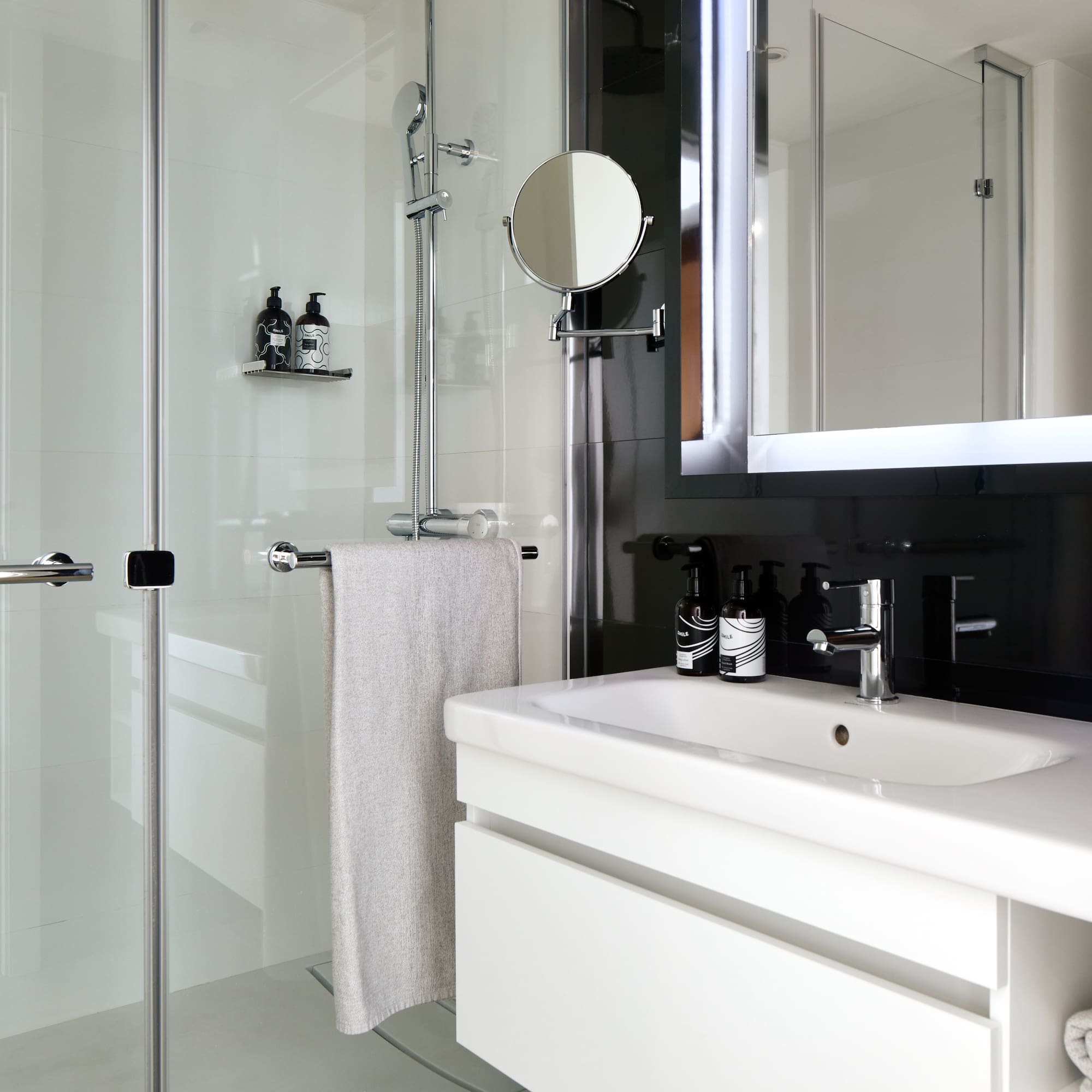 a bathroom with a mirror and sink